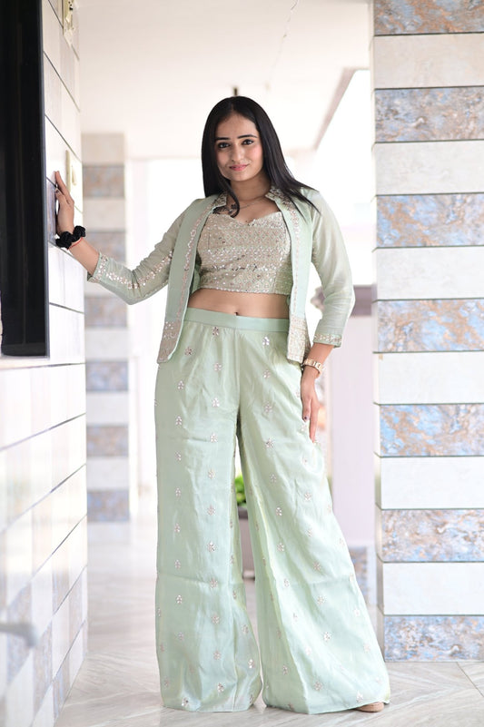 INDO - WESTERN STYLE JACKET WITH INNER CROP TOP AND PALAZZO IN NATURAL SILK FABRIC, FEATURING ALL - OVER SEQUENCE EMBROIDERY WORK - Shreenath Collection